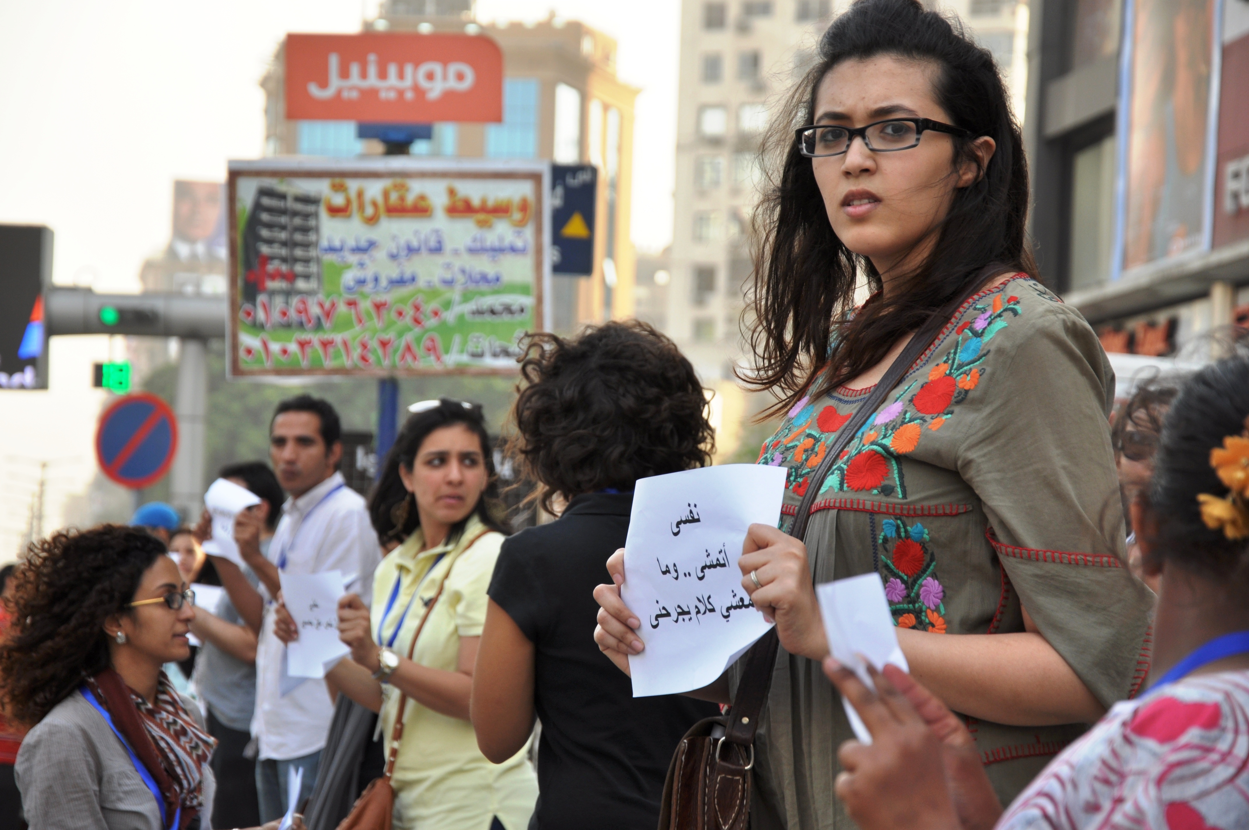 On a Wednesday in May 2012, inspired by snowballing social media discussions on sexual harassment in Egypt, a group of independent activists took the conversation to an offline public. They aimed to build support in Cairo and beyond, using the most simple of approaches: the countryÕs first Ôhuman chainÕ against sexual harassment. Photo Credit: UN Women/Fatma Elzahraa Yassin